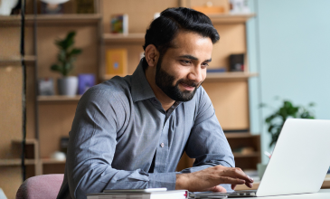 Man looks at computer